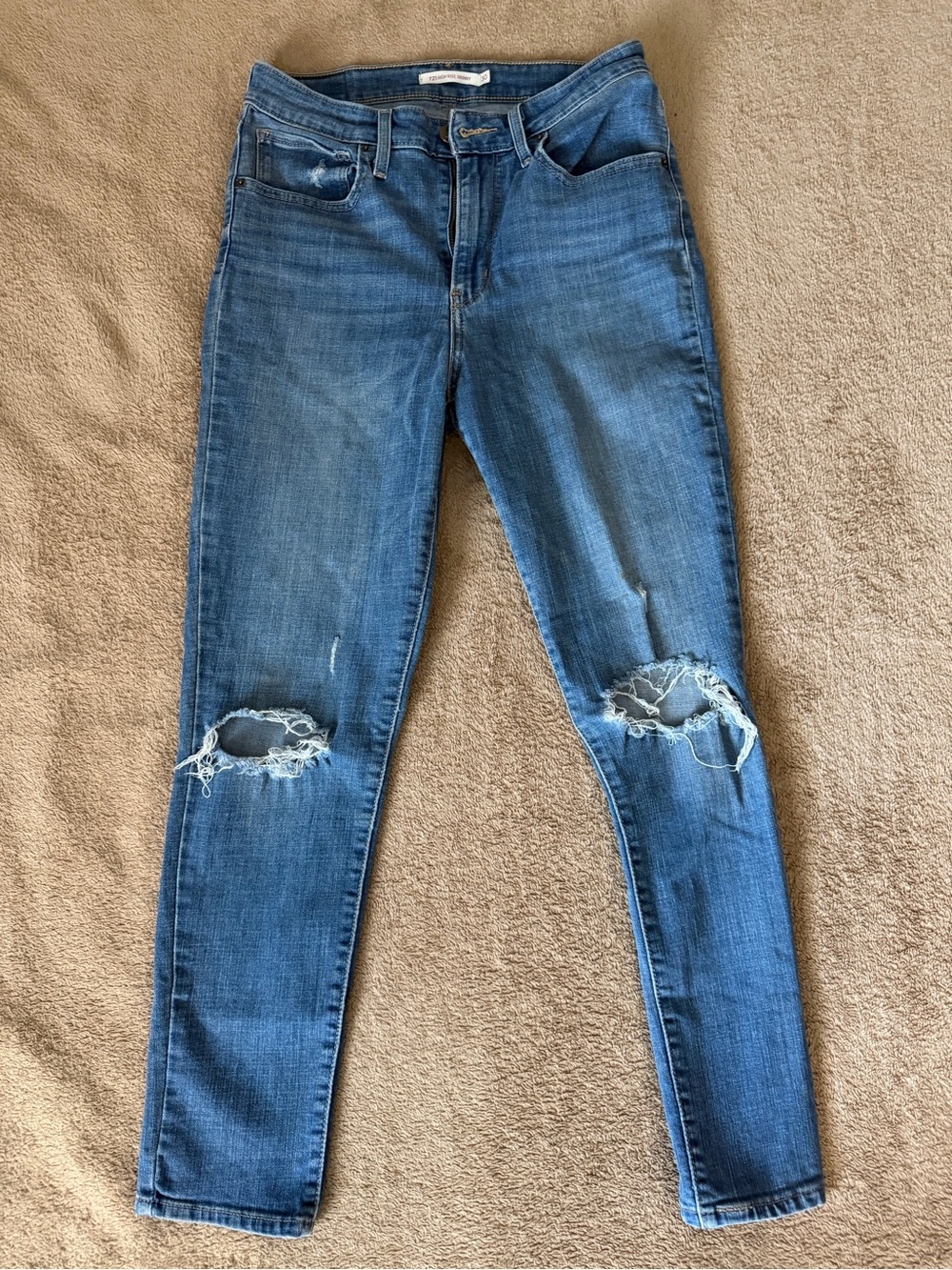 Levi's Blue Distressed Women's Skinny Jeans with Knee Rips